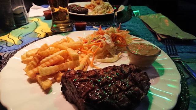 Café International "The Flame Grill Café" in Pointe aux Biches